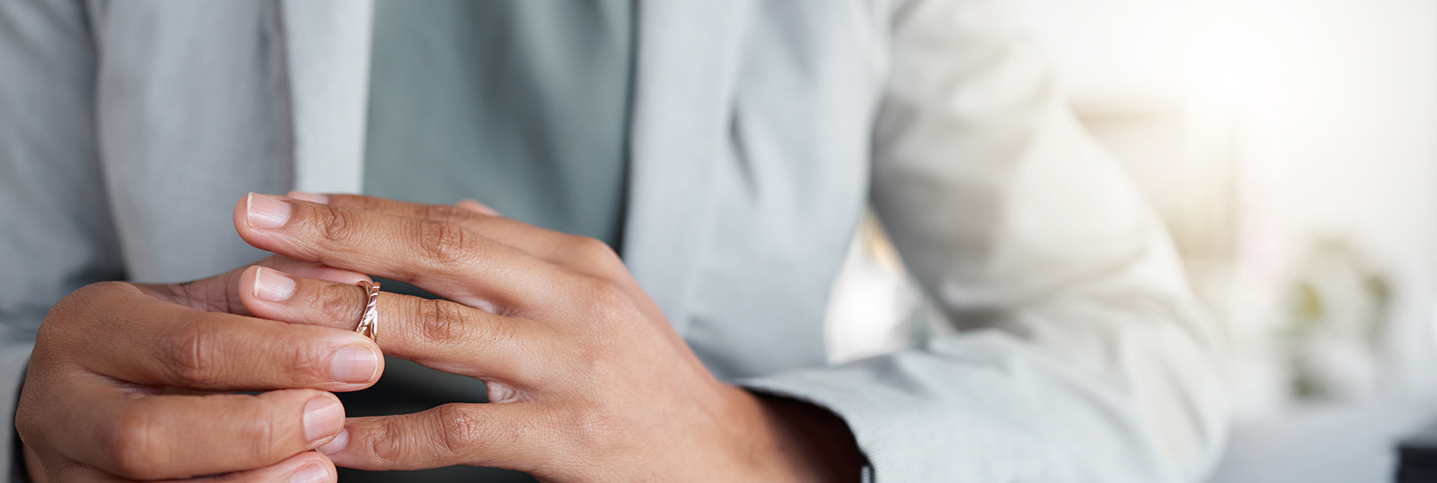 Man removing wedding band